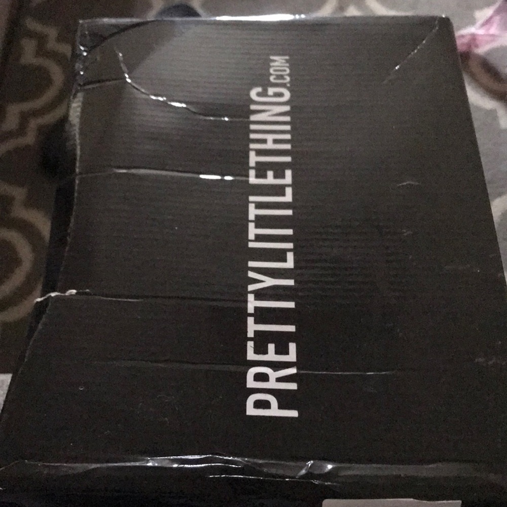 Brand new in the box Pretty Little Things size 5